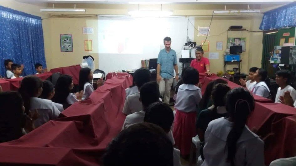 Young people taking part in a classroom session