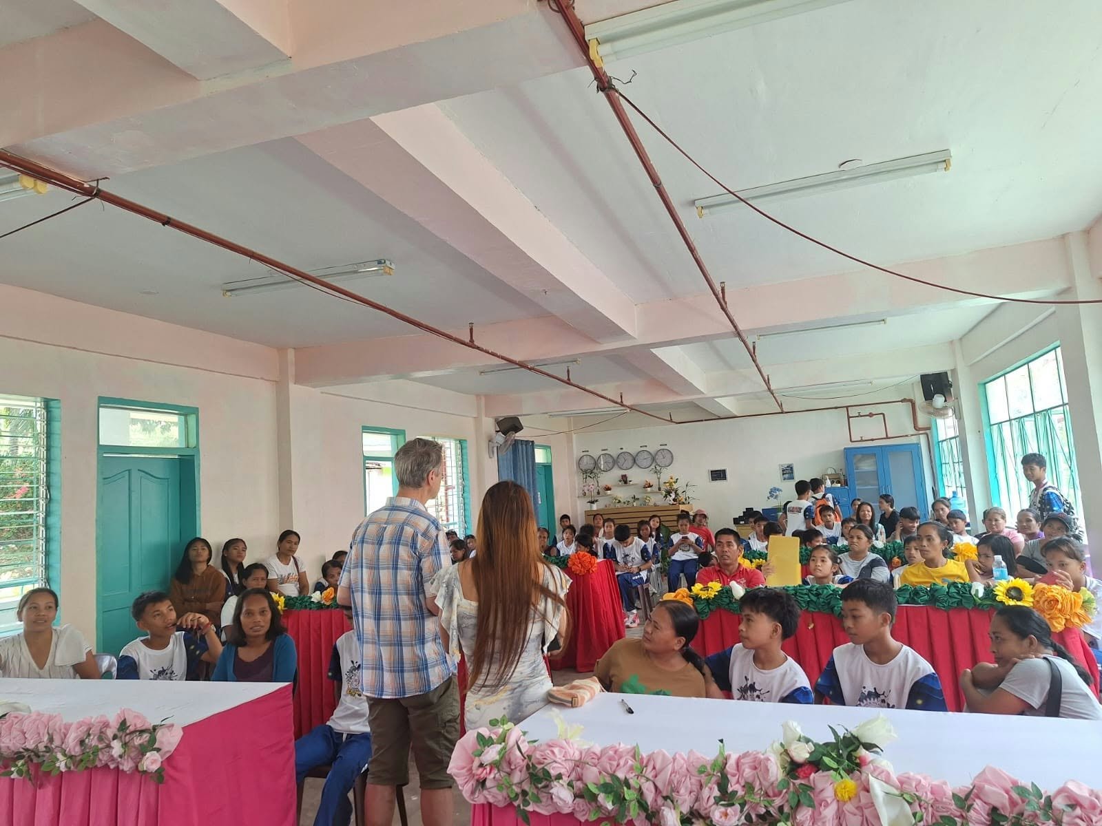 Participants listening during a community learning event
