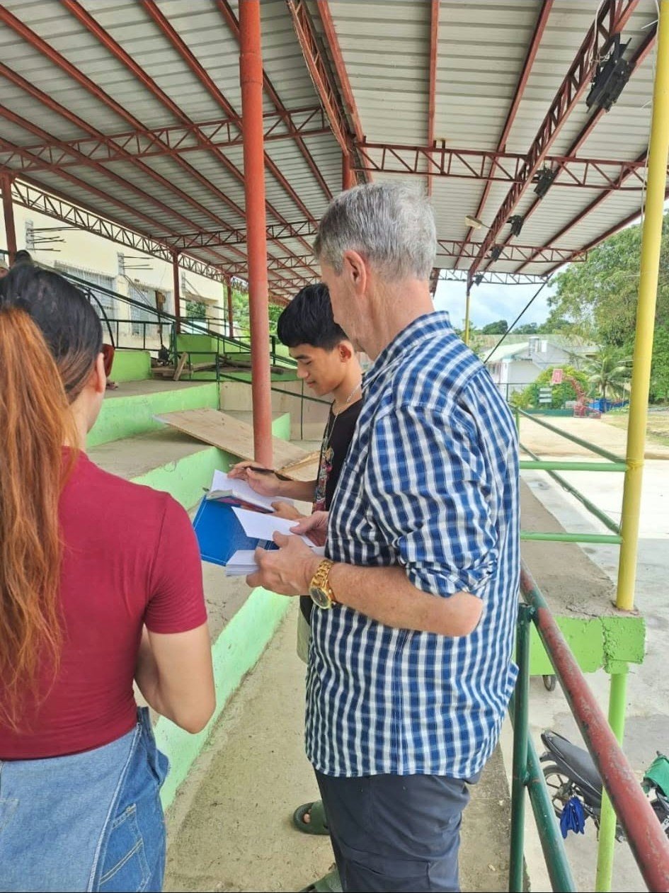 People reviewing notes during a visit